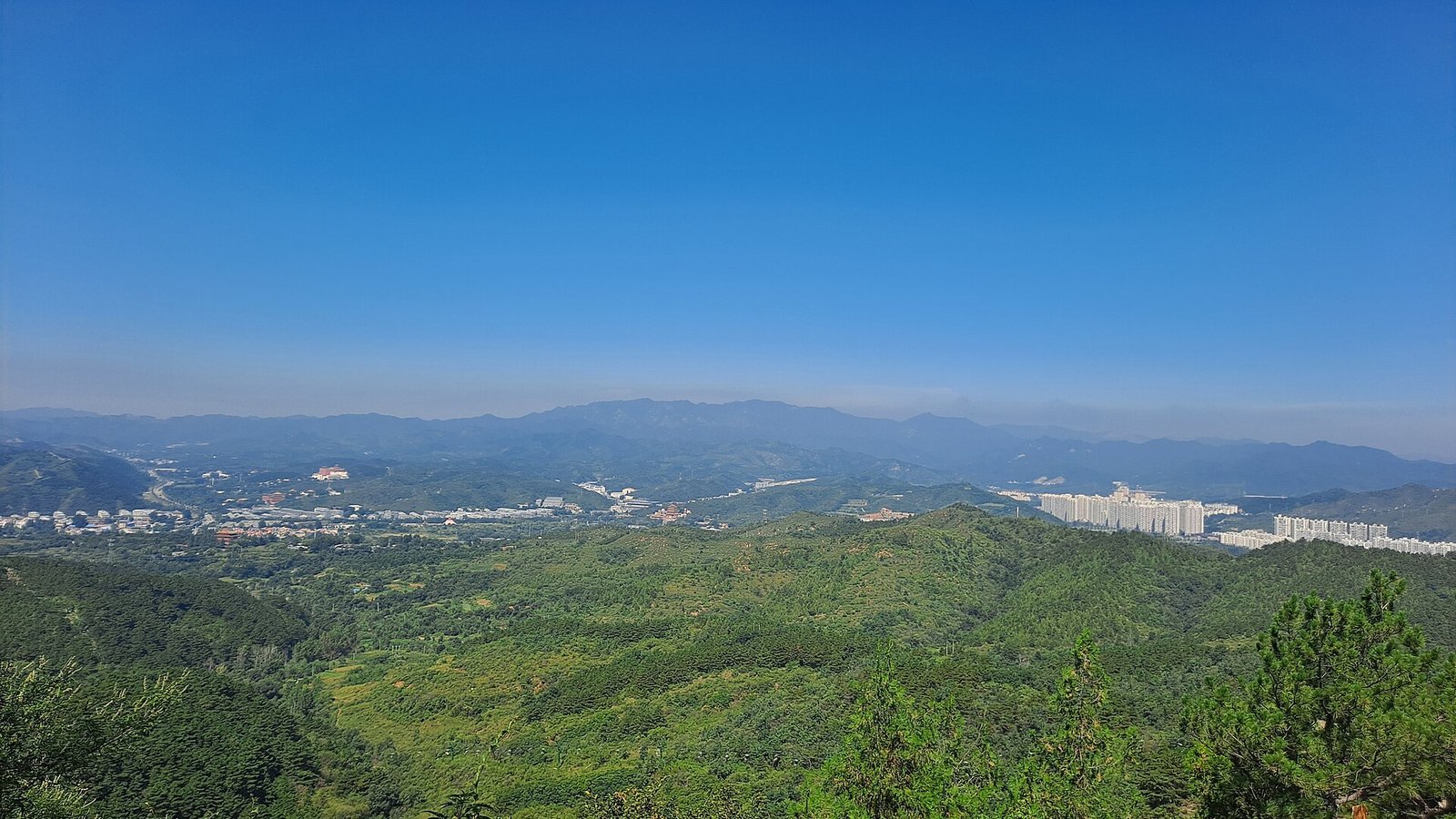 Chengde Mountain Resort: Imperial Autumn Beyond the Wall 8 Forested ridges around Chengde seen from Sledge Hammer Peak, above the mountain zone of the resort