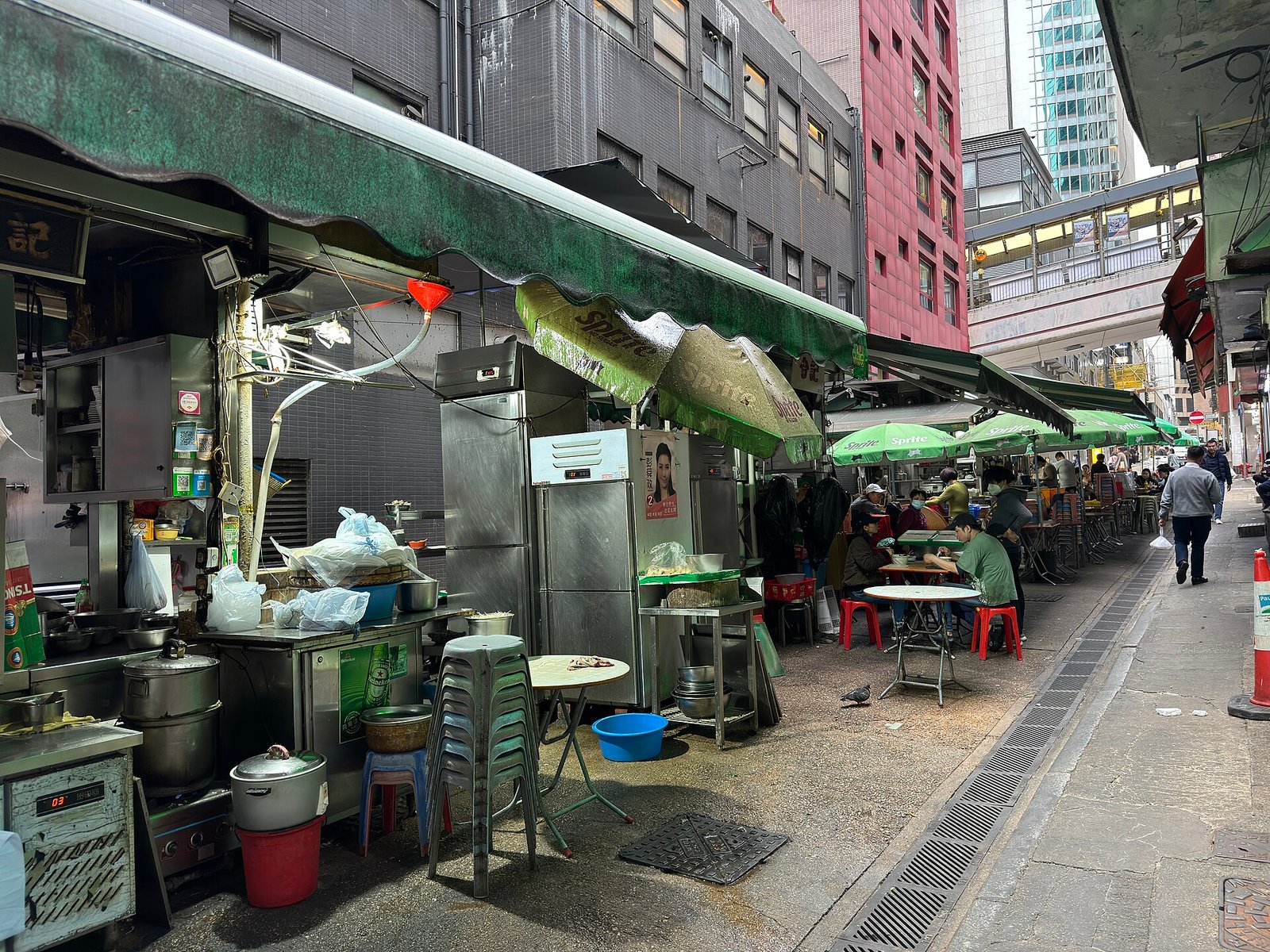 The Stanley Street dai pai dong in Central, Hong Kong, with stalls, tables and diners along the pavement