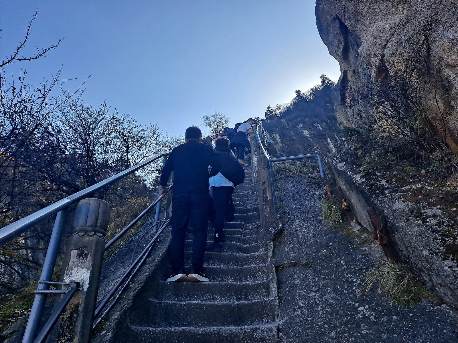 Huashan's Plank Road: China's Most Terrifying Footpath 3 Canglong Ridge path on Mount Hua with chains and stone steps along the crest