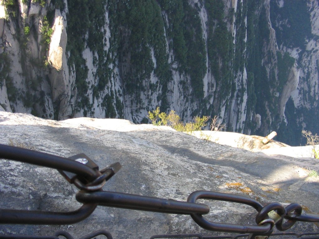 Huashan's Plank Road: China's Most Terrifying Footpath 1 Huashan plank road timber battens fixed to the cliff face on the south side of the South Peak