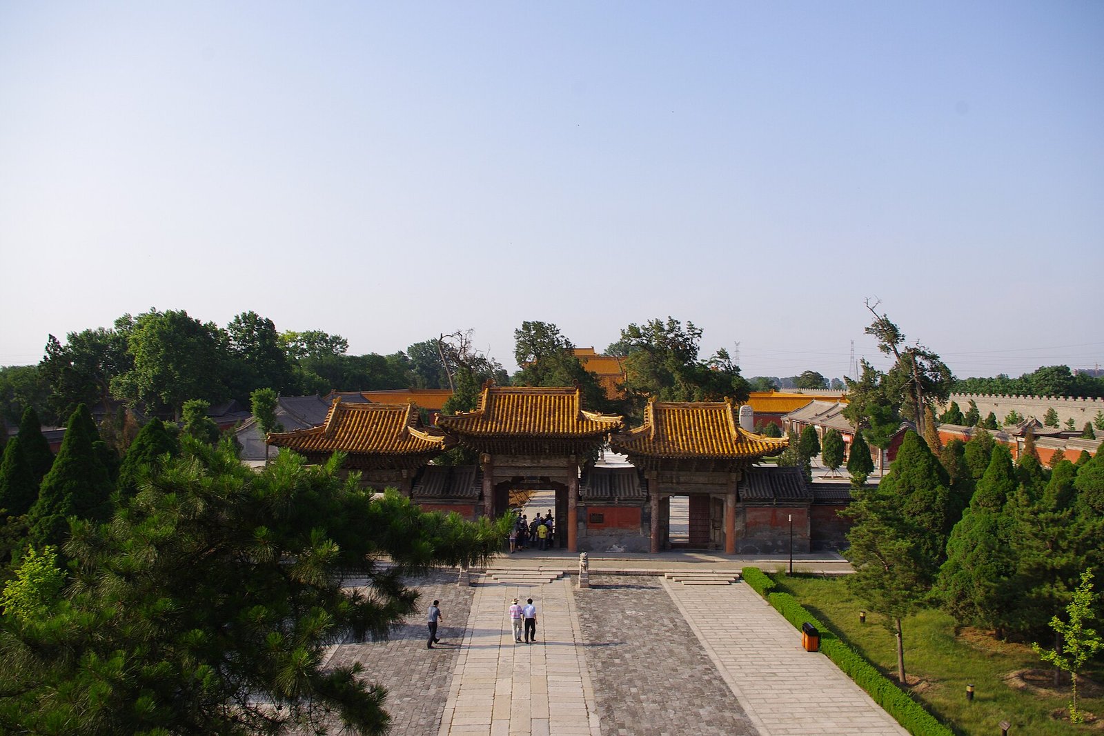 Huashan's Plank Road: China's Most Terrifying Footpath 5 Xiyue Temple gate at Huayin below Mount Hua, with red walls and yellow roof tiles