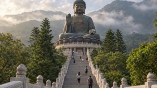 The Tian Tan Big Buddha statue on Lantau Island, Hong Kong, seen from the base of the stone steps