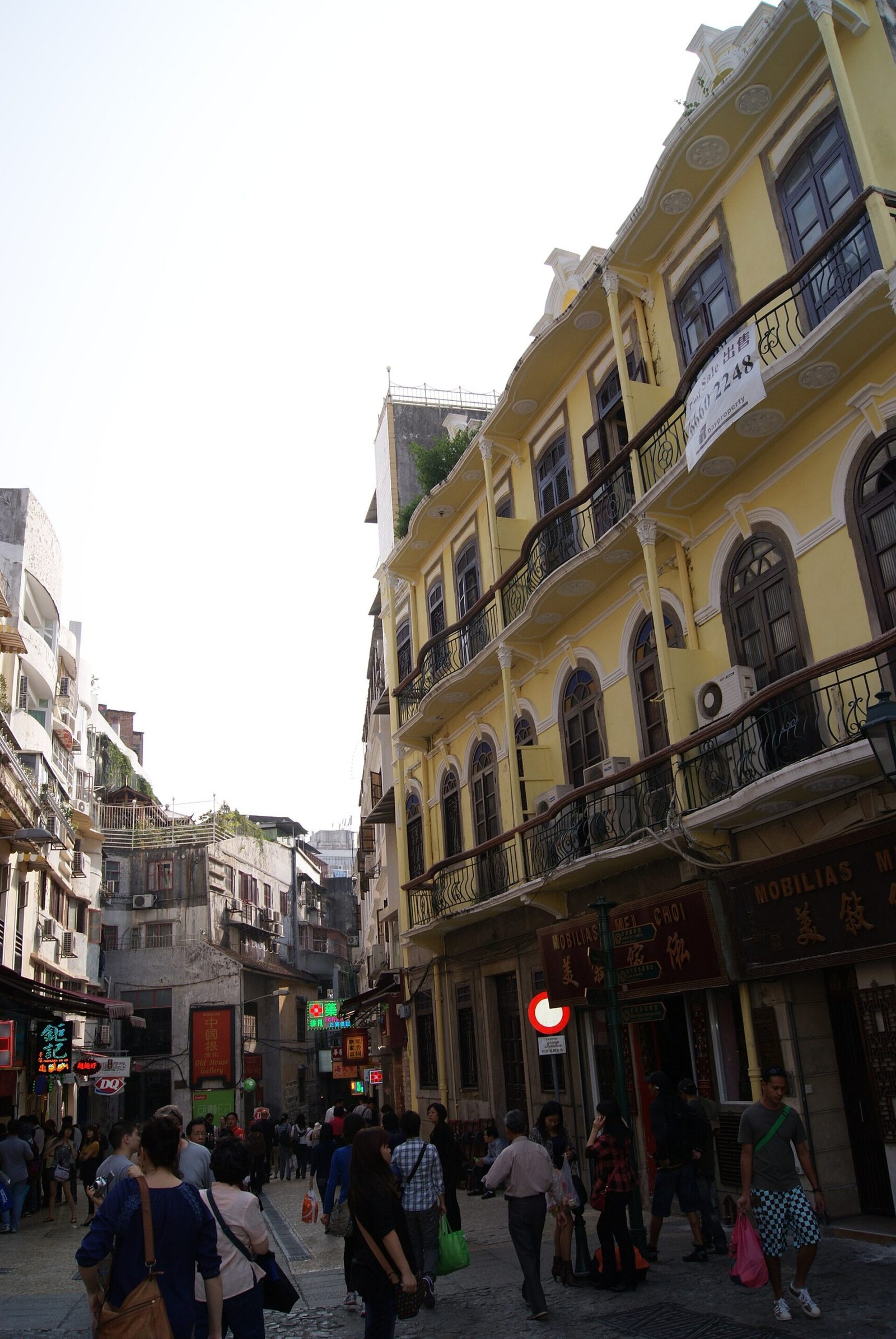 Macau Historic Centre: Walking the City Where East Met West 2 Portuguese colonial buildings lining a cobbled lane leading to Senado Square in Macau