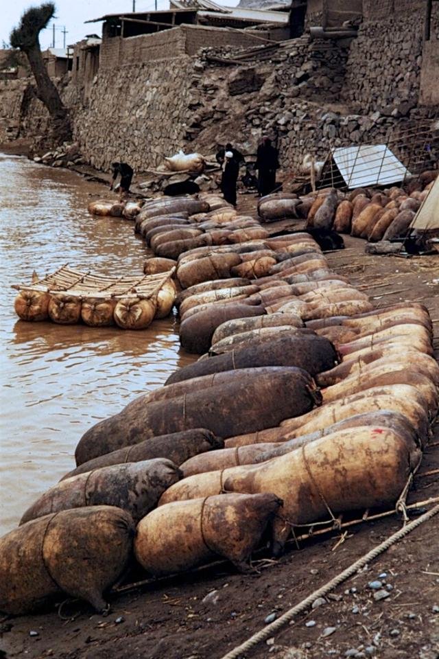 Inflated sheepskin rafts stacked on the bank of the Yellow River near Shapotou