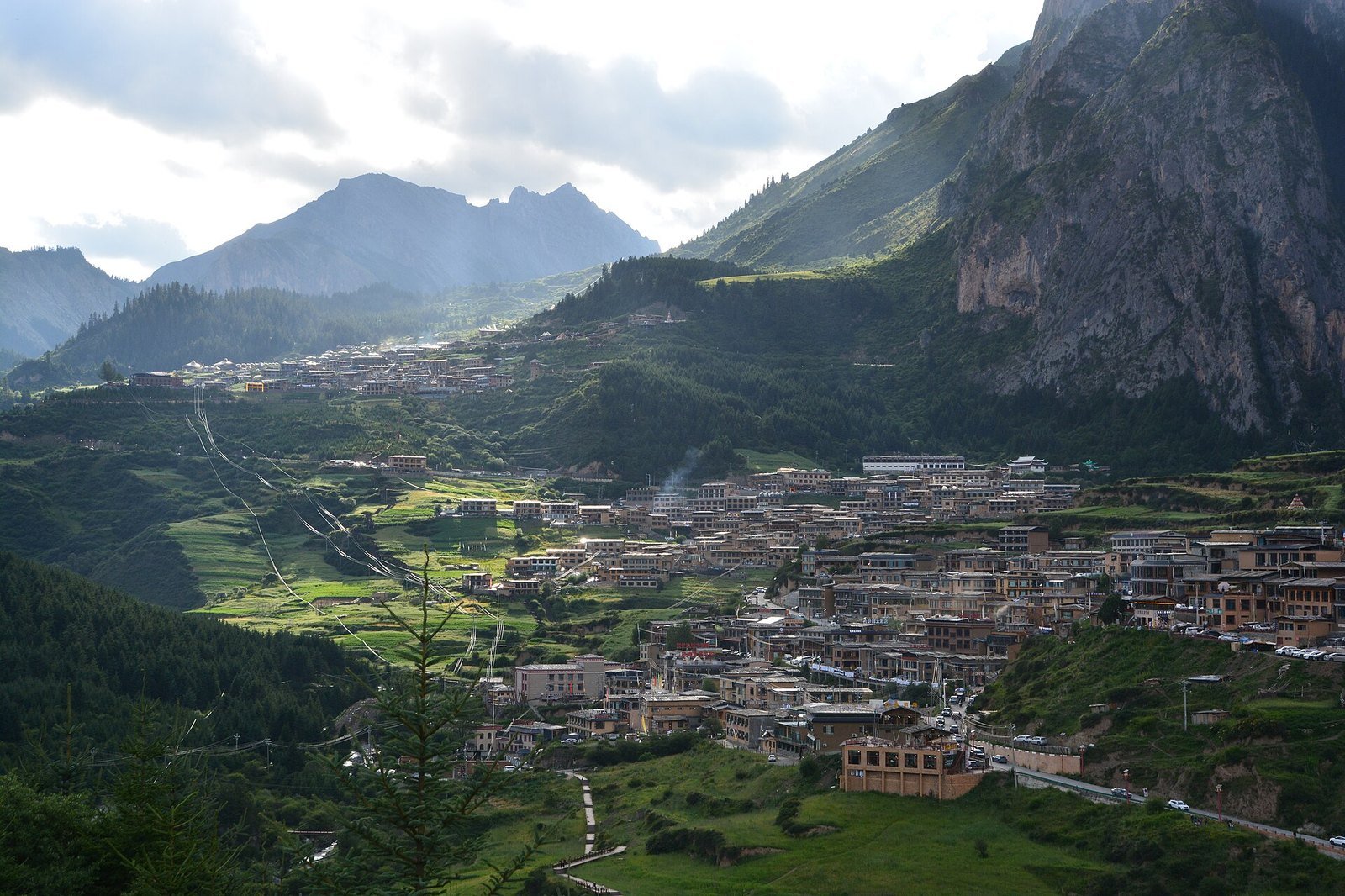 Zhagana: The Stone Box Valley of Gannan's Tibetan Farms 1 Zhagana valley panorama with four Tibetan villages below limestone cliffs in Gannan