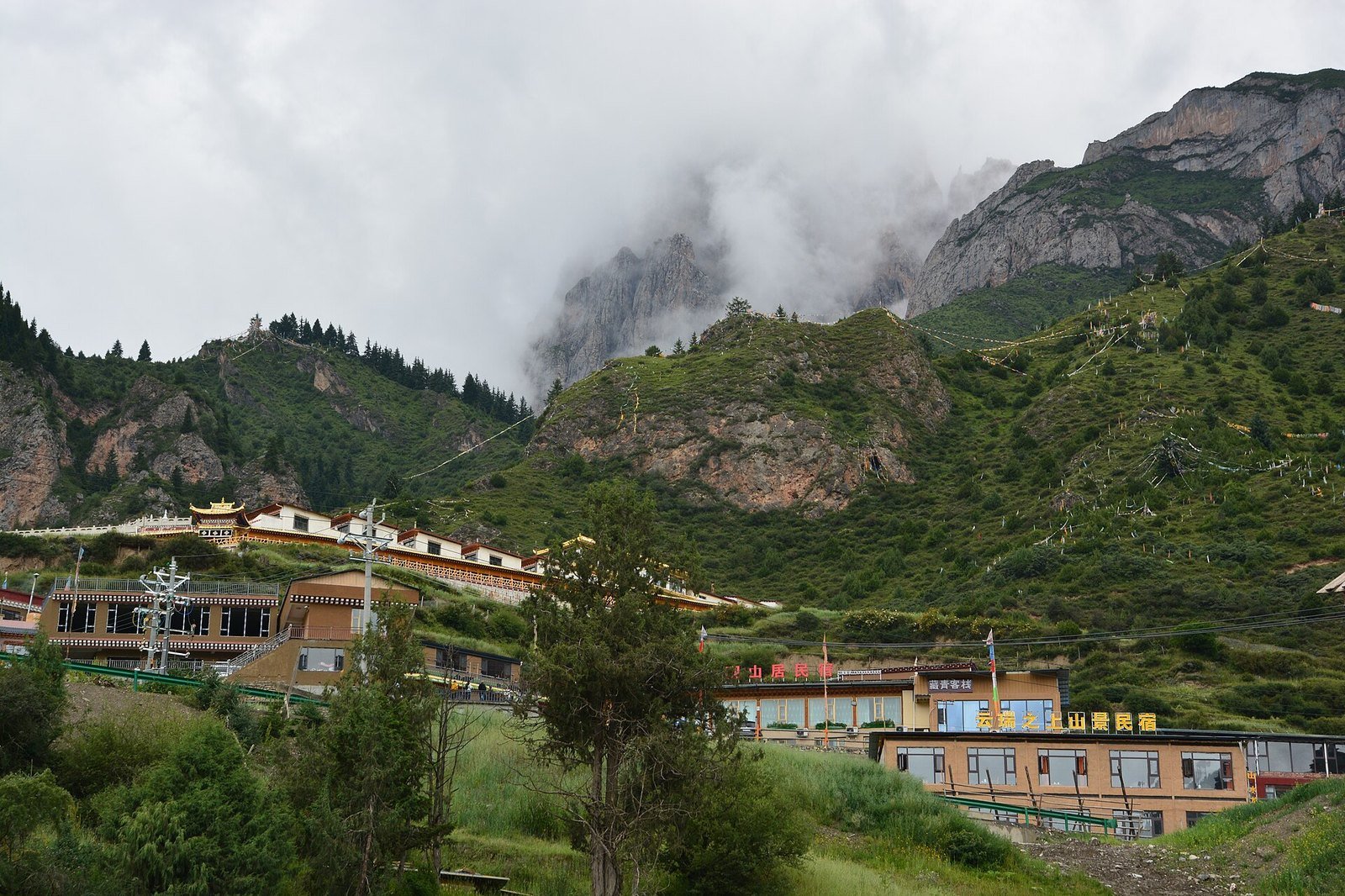 Zhagana: The Stone Box Valley of Gannan's Tibetan Farms 3 Lasang Monastery and prayer flags above Dongwa village in Zhagana